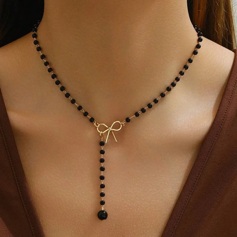 Pearl Necklace with Black Knot Pendant