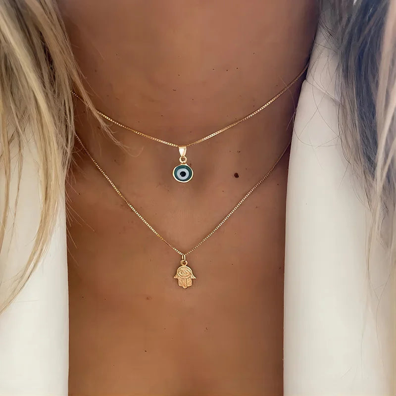 Double Necklace with Turkish Blue Eye Pendant and Gold Hamsa Hand