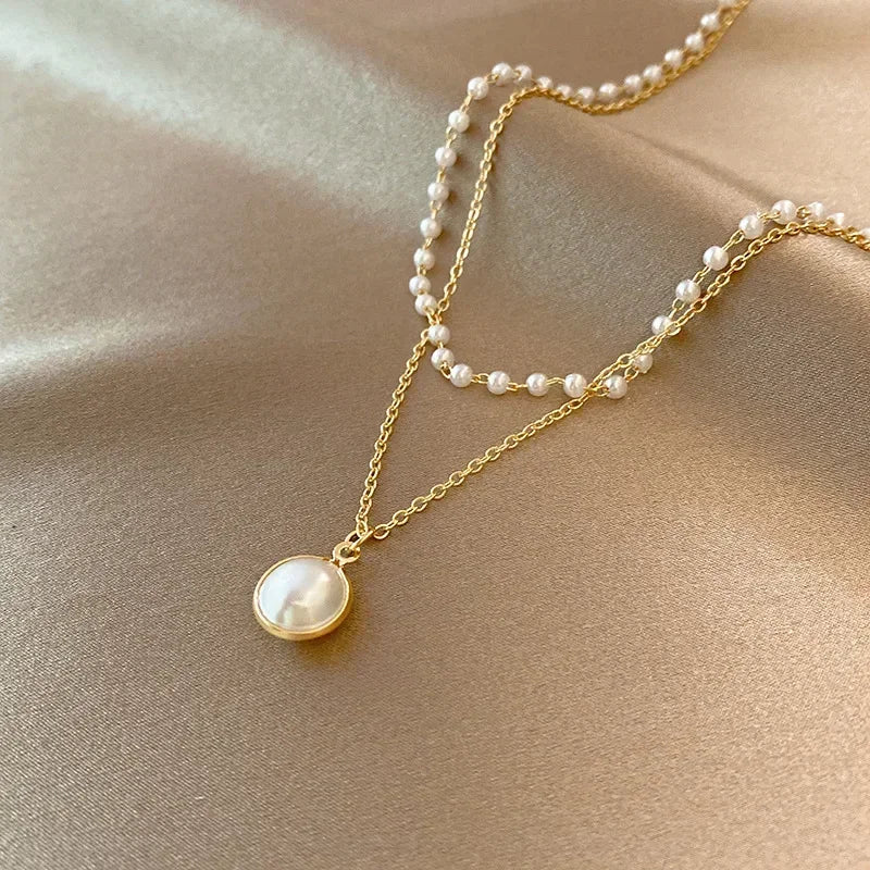 Elegant Double Necklace with Gold Pearl Pendant