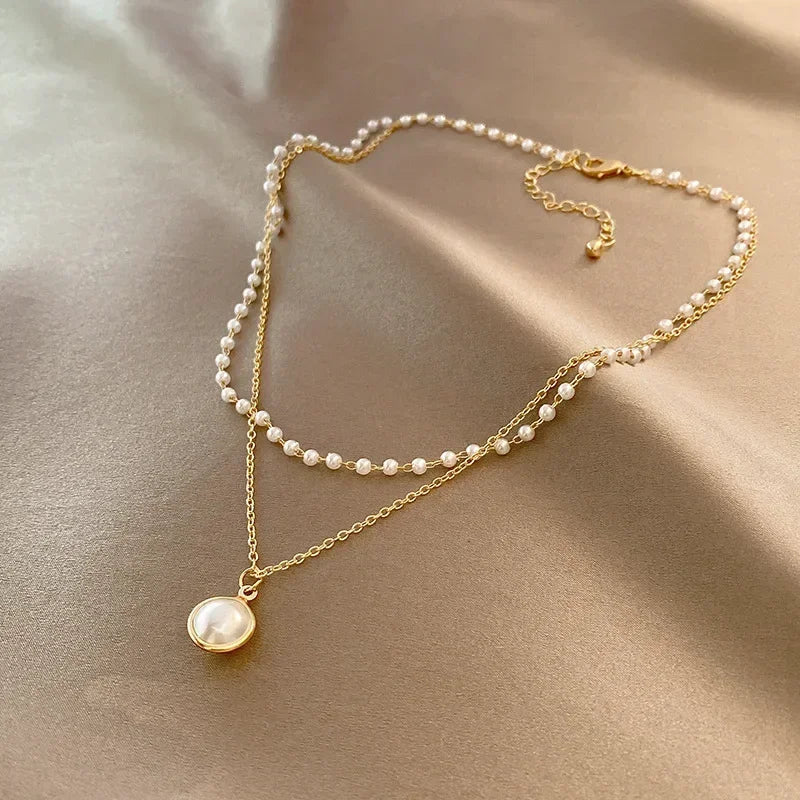 Elegant Double Necklace with Gold Pearl Pendant