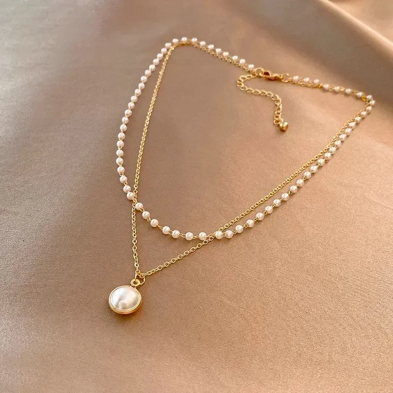 Elegant Double Necklace with Gold Pearl Pendant