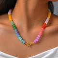 Collier avec pendentif arc-en-ciel et perles