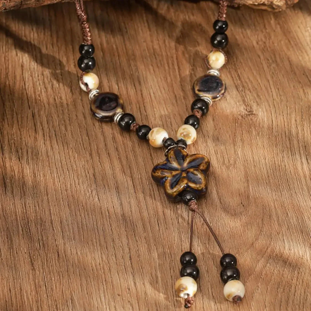Pearl Necklace with Brown Flower Pendant