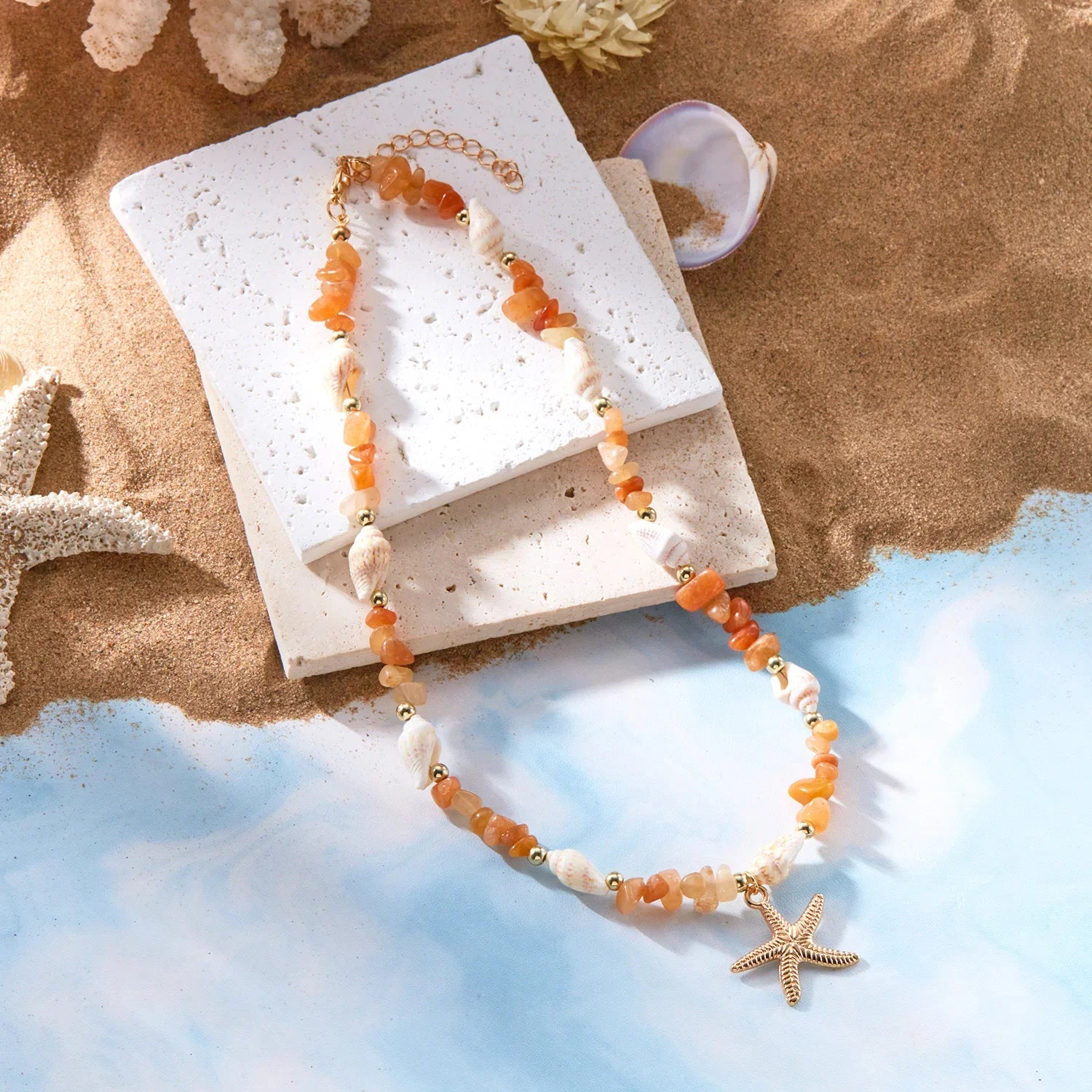 Collier et son pendentif coquillage pour femme orange