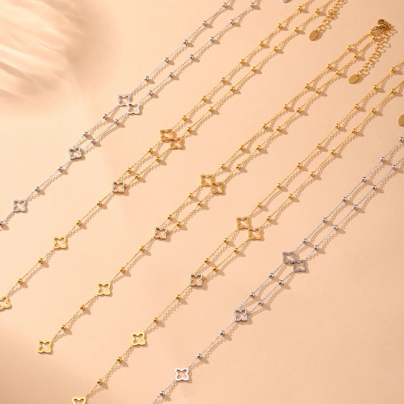 Long Necklace with Four-Leaf Clover and Zircon Pendants Gold