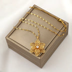 Collier Pendentif avec Jolie Fleur Tournante Anti-Stress