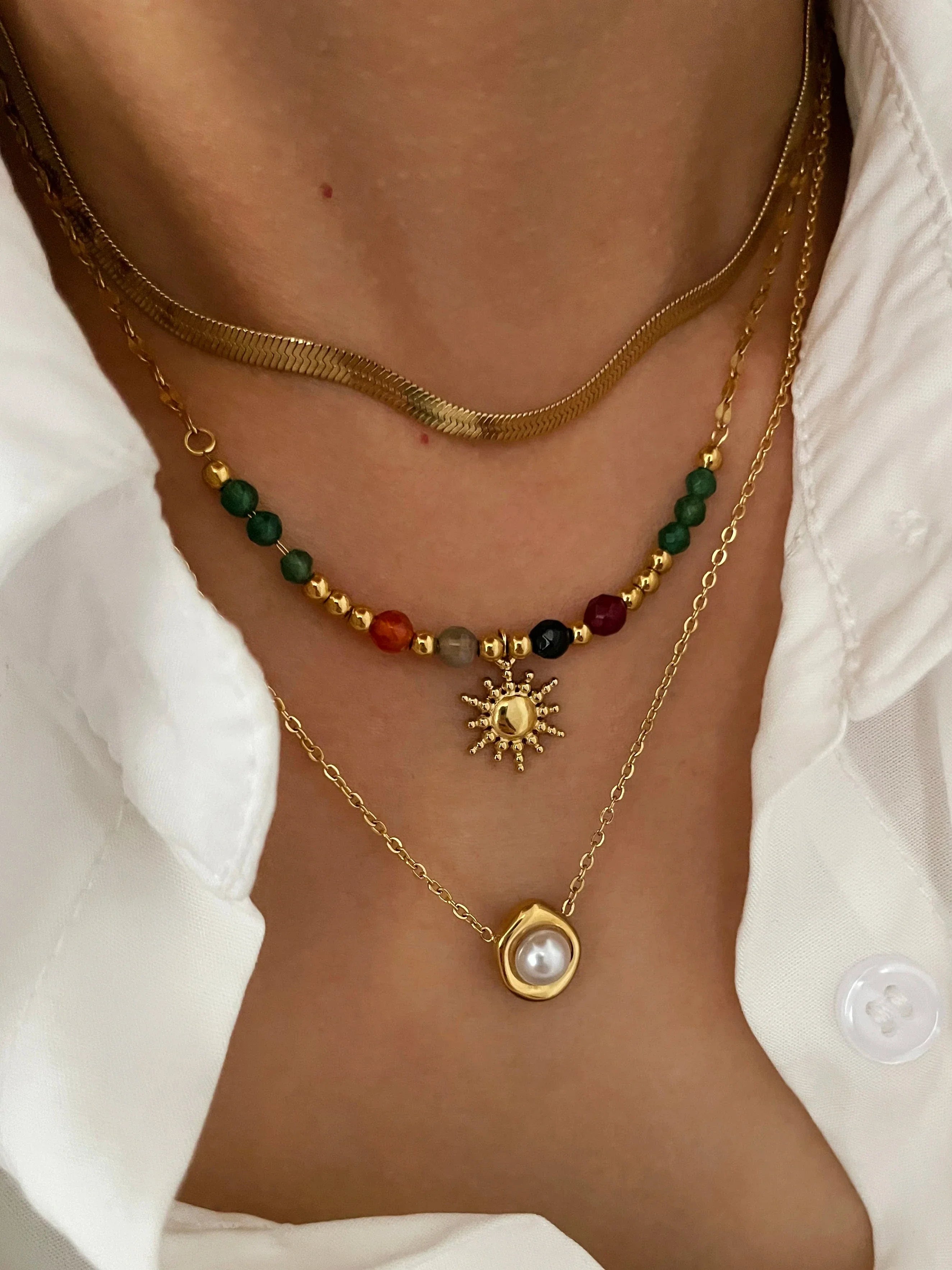 Sun Pendant Necklaces and Pearls a