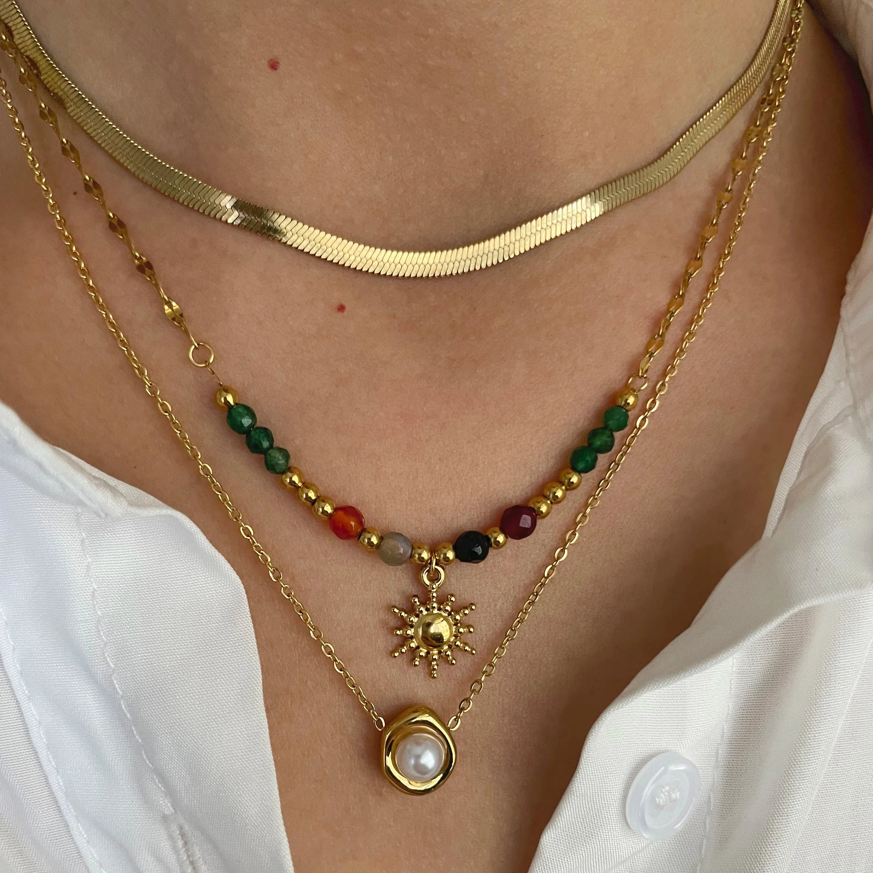 Sun Pendant Necklaces and Pearls a