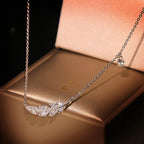 Collier plume scintillant pour femme