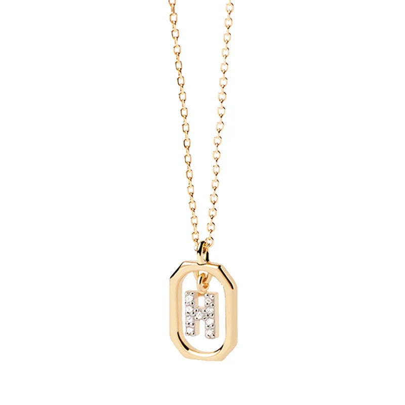Collier femme avec pendentif hexagonale initiale h