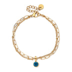 Double bracelet doré avec pierre de naissance