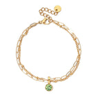 Double bracelet doré avec pierre de naissance