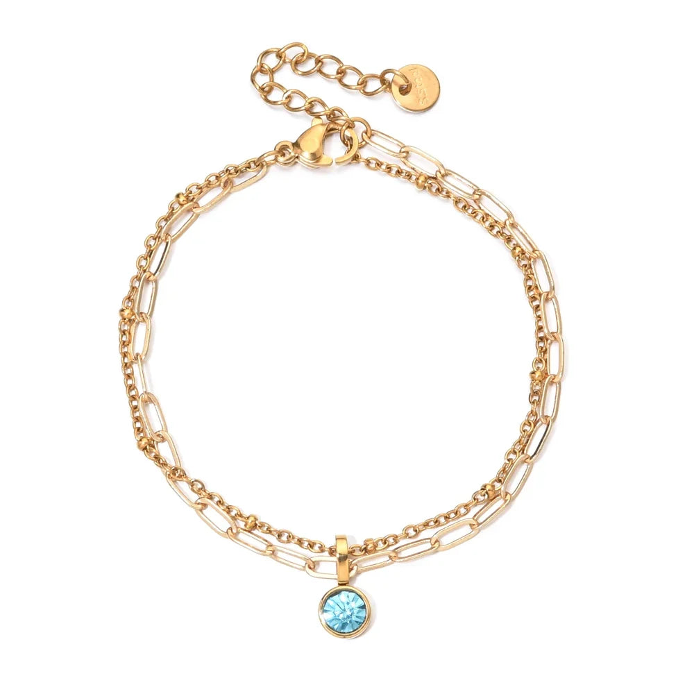 Double bracelet doré avec pierre de naissance