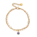 Double bracelet doré avec pierre de naissance