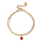Double bracelet doré avec pierre de naissance