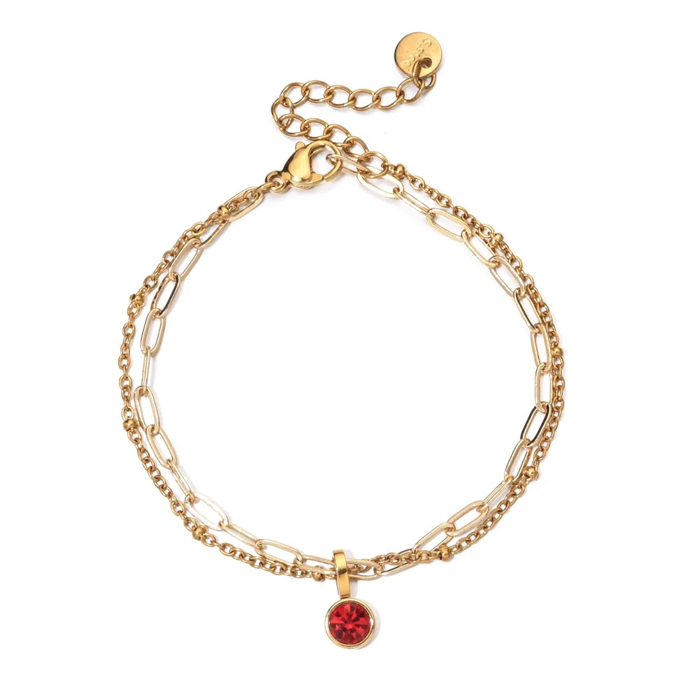 Double bracelet doré avec pierre de naissance