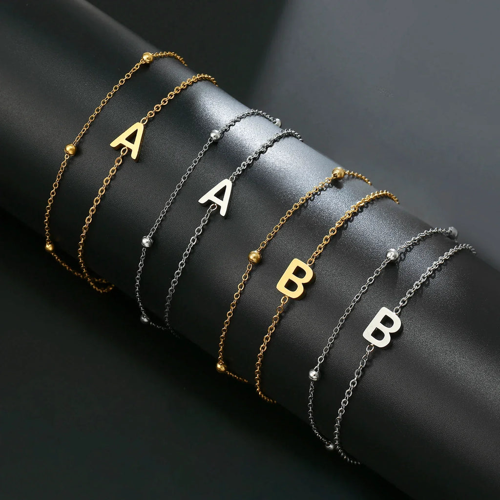Bracelet double initiale or et argent