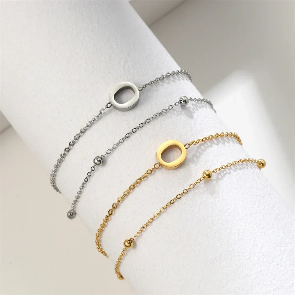 Bracelet double initiale or et argent  o