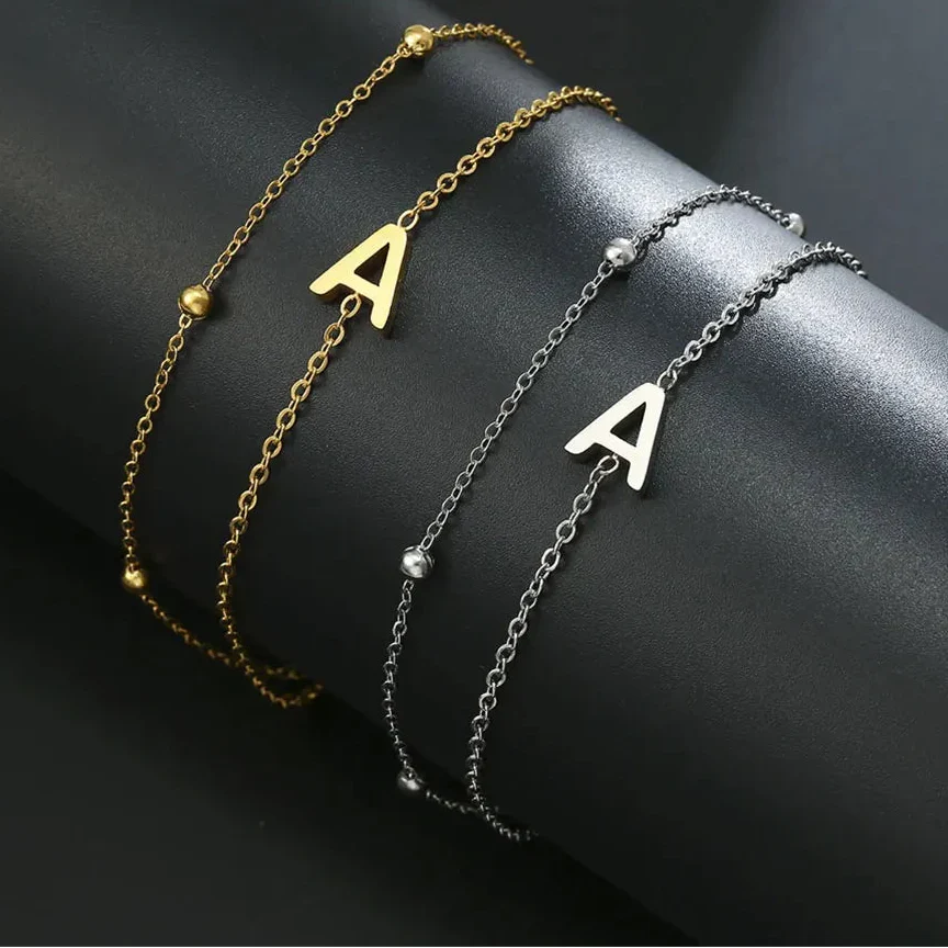 Bracelet double initiale or et argent a