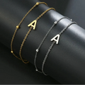 Bracelet double initiale or et argent a