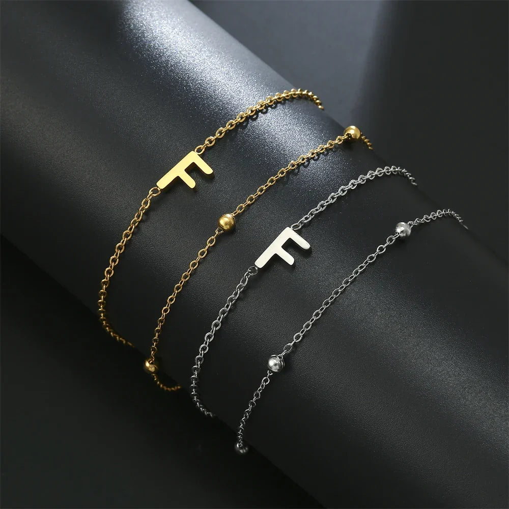 Bracelet double initiale or et argent  f
