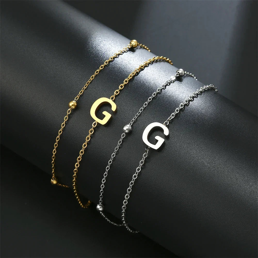 Bracelet double initiale or et argent  g