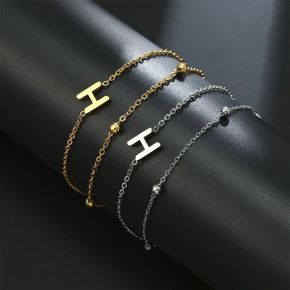 Bracelet double initiale or et argent  h