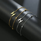 Bracelet double initiale or et argent  h