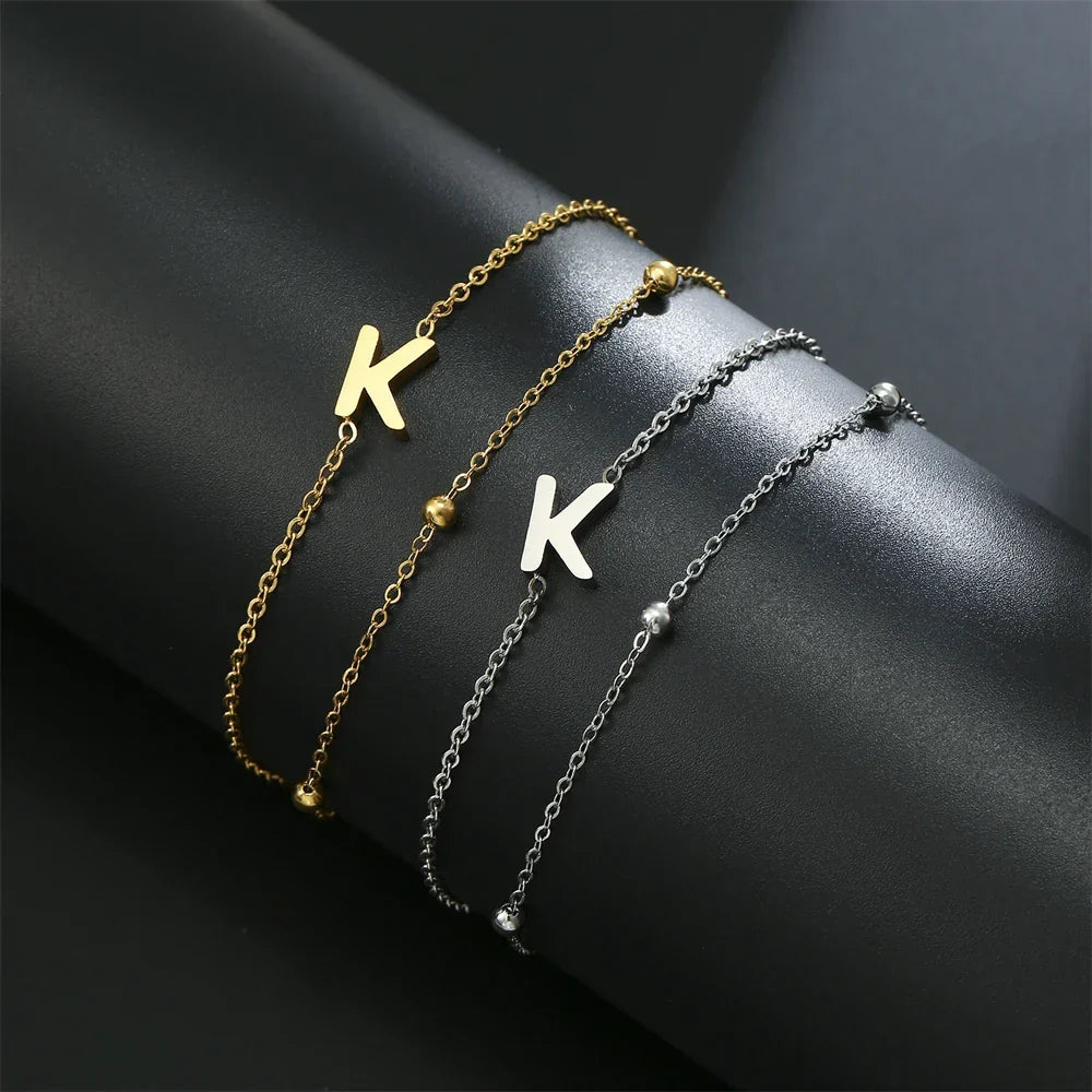 Bracelet double initiale or et argent k