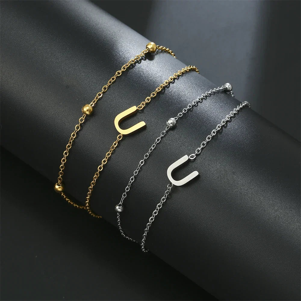 Bracelet double initiale or et argent  u