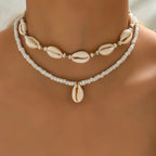 Double collier coquillage cauri blanc