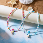 Double collier coquillage et perles colorées bleu étoile