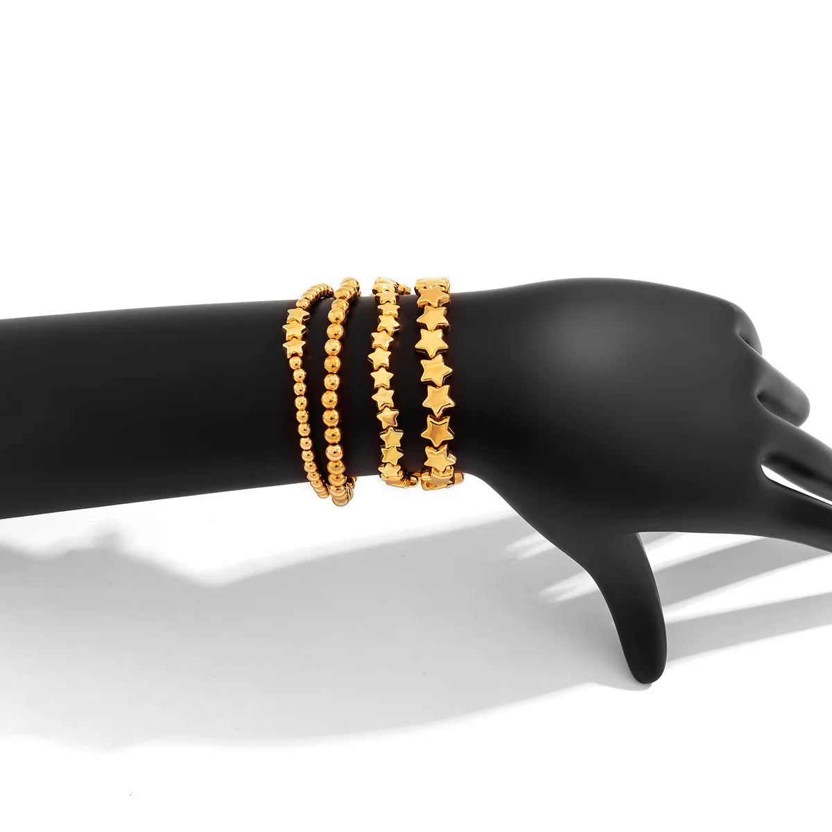 Set of 4 Gold Star Bracelets