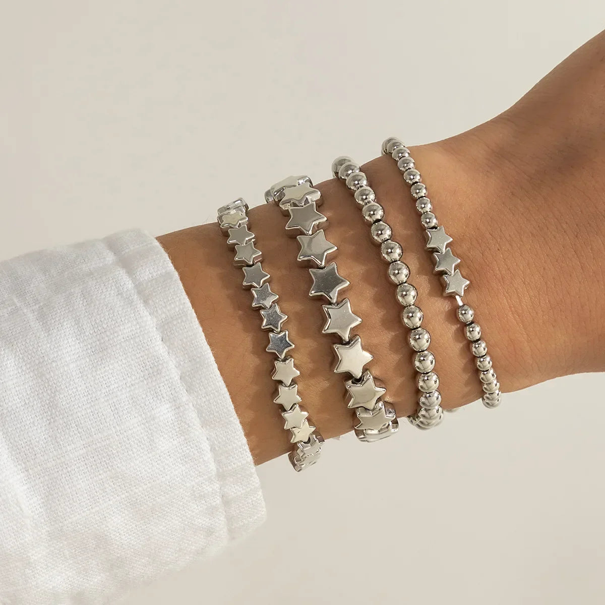 Set of 4 Silver Star Bracelets