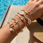 Lot de 5 bracelets coquillage et étoile dorés
