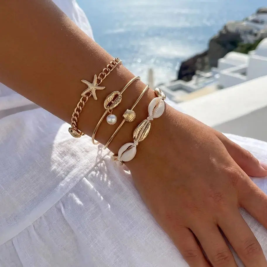 Lot de 5 bracelets coquillage et étoile dorés